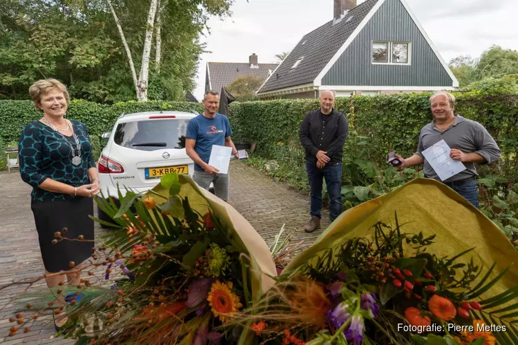 Bronzen legpenningen Carnegie Heldenfonds voor Robert de Lange en Edwin Zoetelief